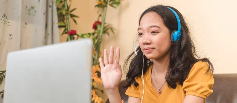 Female Filipino accounting virtual assistant in a call with her client